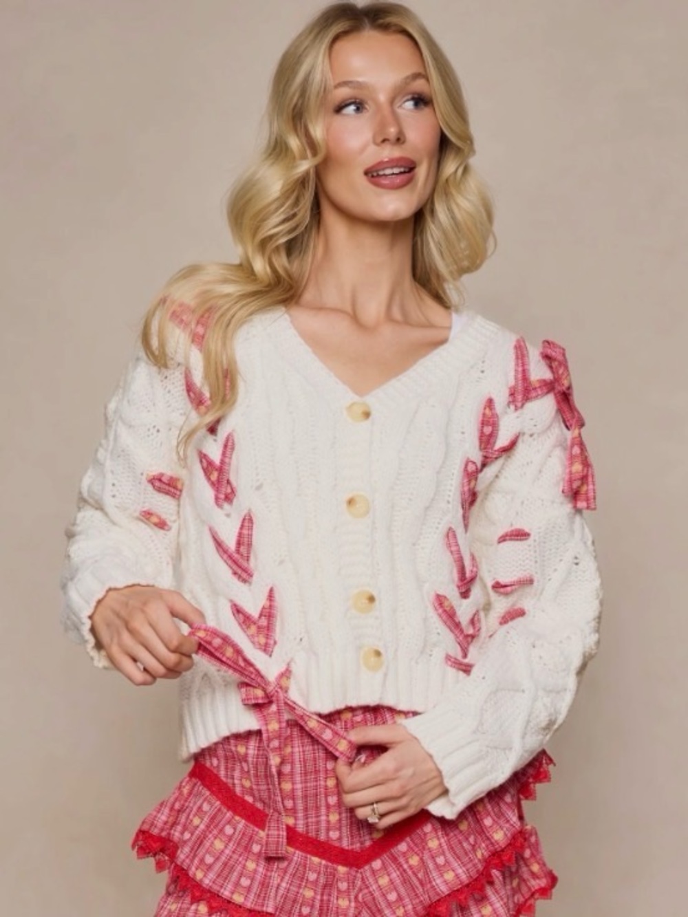 Ivy City Co “Agatha” Cream Cable-Knit Cardigan with Pink Ribbon Braids